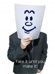 3 - fake it till you make it - smiley face held up in front of head